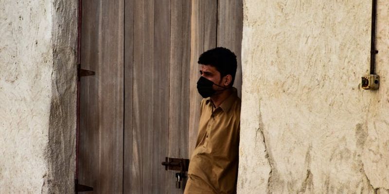 Shadow of a person moving gracefully against a wall